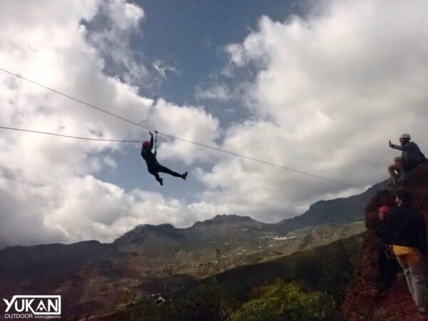 Person on a zipline.