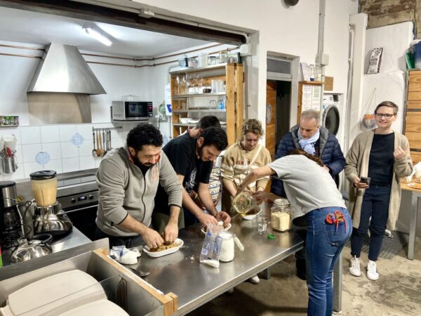 People cooking during the workshop.