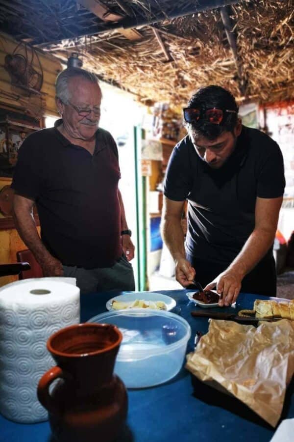 Someone cutting food.