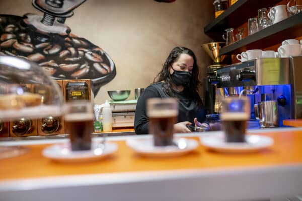 Barista making coffee.